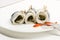 Herring pickled - rollmops on a plate.
