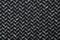 Herringbone fabric pattern texture background closeup