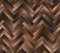 Herringbone natural dark parquet seamless floor texture