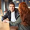 Hes got loads of charm. A cropped shot of a young affectionate couple on a coffee date.