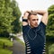 Hes got some serious determination. a sporty young man stretching before a run outdoors.