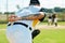 Hes one skillful pitcher. Cropped shot of an unrecognizable baseball player preparing to pitch a ball during a match on