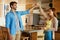 Hes taking the lead. an affectionate young couple dancing in their kitchen.