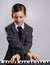 Hes a virtuoso. Studio shot of a young musician dressed in a suit.