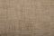 Hessian sackcloth burlap woven texture background / cotton woven fabric background with flecks of varying colors of beige and brow