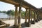 Hever castle garden\'s colonnade, patio at a lakeside in England