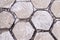 Hexagon tile paved sidewalk. background, urban.