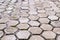 Hexagon tile paved sidewalk with perspective view. background, urban.