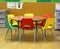 Hexagonal table with small chairs in elementary school