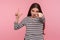 Hey, you lost! Portrait of angry bossy woman in striped sweatshirt showing L sign, loser gesture and pointing to camera