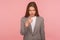 Hey you! Portrait of strict displeased young woman in business suit making choice with indicating finger