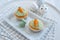 Hhome made easter cupcakes with marzipan carrots on a table