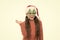 Hi there. Happy about new year. Christmas holiday. Small girl in santa hat. Happy child christmas tree eyewear accessory