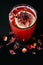 Hibiscus cocktail on black background