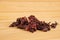 Hibiscus tea on a wooden background. Tea benefits concept