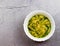 Ð¡hicken noodle soup a white bowl on a light grey background
