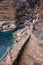 Hidden houses in the tourist attraction pirate cave of El Poris