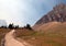 HIDDEN LAKE HIKING TRAIL ON LOGAN PASS UNDER CIRRUS CLOUDS DURING THE 2017 FALL FIRES IN GLACIER NATIONAL PARK IN MONTANA USA