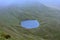 A hidden magical enchanted lake in the hills (Llyn Cwm Llwch) near Pen y Fan peak, Brecon Beacons , Wales, UK