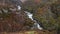 The hidden waterfall of the Falls of Kincaid beside the dramatic mountain of Suilven in Assynt Scotland.