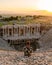 Hierapolis ancient city Pamukkale Turkey, young men watching sunset by the ruins Unesco