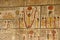 Hieroglyphs on the wall in King Tut`s Tomb in the Valley of Kings in Luxor, Egypt