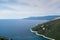 High aerial view to sea bay, peninsula and mountain