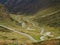 High Alpine Road winding in valley