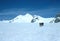 High alpine skiers on the way to the summit in winter Bernese Oberland in Switzerland