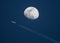 High Altitude Airliner and Gibbous Moon