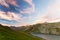 High altitude alpine lake, Gran Paradiso mountain range at sunset