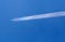 High Altitude Jet Contrail in Blue Sky