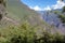 High-altitude jungle lush flora in green Rio Bianco Valley after Choquequirao pass, Andes, Peru