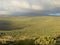 High altitude moorland against a foggy mountain background at Mount Kenya