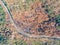 High angle aerial bird`s eye drone view of a bushfire affected country road near Sydney, New South Wales, Australia