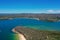 High angle aerial drone view of Balmoral Beach and Edwards Beach in the suburb of Mosman, Sydney, New South Wales, Australia. CBD