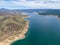 High angle aerial drone view of Blowering Reservoir dam near Tumut in the Snowy Mountains region of New South Wales, Australia