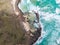 High angle aerial drone view of `Champagne pools` rock pools just north of Indian Head headland and 75 Mile Beach on Fraser Island