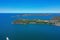 High angle aerial drone view of Cobblers Beach and Middle Head in the suburb of Mosman, Sydney, New South Wales, Australia. South