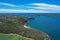 High angle aerial drone view of Grotto Point and Washaway Beach in the suburb of Clontarf, Sydney, New South Wales, Australia.