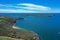 High angle aerial drone view of Grotto Point and Washaway Beach in the suburb of Clontarf, Sydney, New South Wales, Australia.