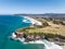 High angle aerial drone view of Lawyers Head and beach, Saint Kilda Beach and Saint Clair Beach front to backin Dunedin