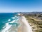 High angle aerial drone view of Tomahawk Beach, Lawyers Head and beach, Saint Kilda Beach and Saint Clair Beach front to back