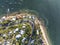 High angle aerial evening bird\\\'s eye view of Palm Beach coastline and the ferry Wharf.