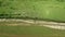 High angle aerial view of flock of sheep in pasture