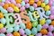 High angle and close up of Easter banner letters surrounded by colorful Easter eggs