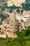 High angle close up shot of a temple made of sand stone in the heart of a small city of Rajasthan