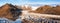 High angle drone shot of the Svinafellsjokull glacier, mountains and glacial lagoon. Wide autumn panorama