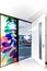 High angle entrance with white walls and colorful design