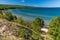 High angle of Great Sand Bay of Lake Superior covered with greenery on Keweenaw peninsula, Michigan